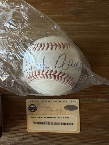 Hank Aaron Autographed Baseball Steiner And MLB Authenticated