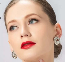 Clip on 1 1/4" silver or gold textured loose knot button style earrings