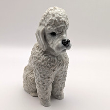 Statuina barboncino 5 1/2" porcellana cane seduto figura #1027 Rosenthal Germania