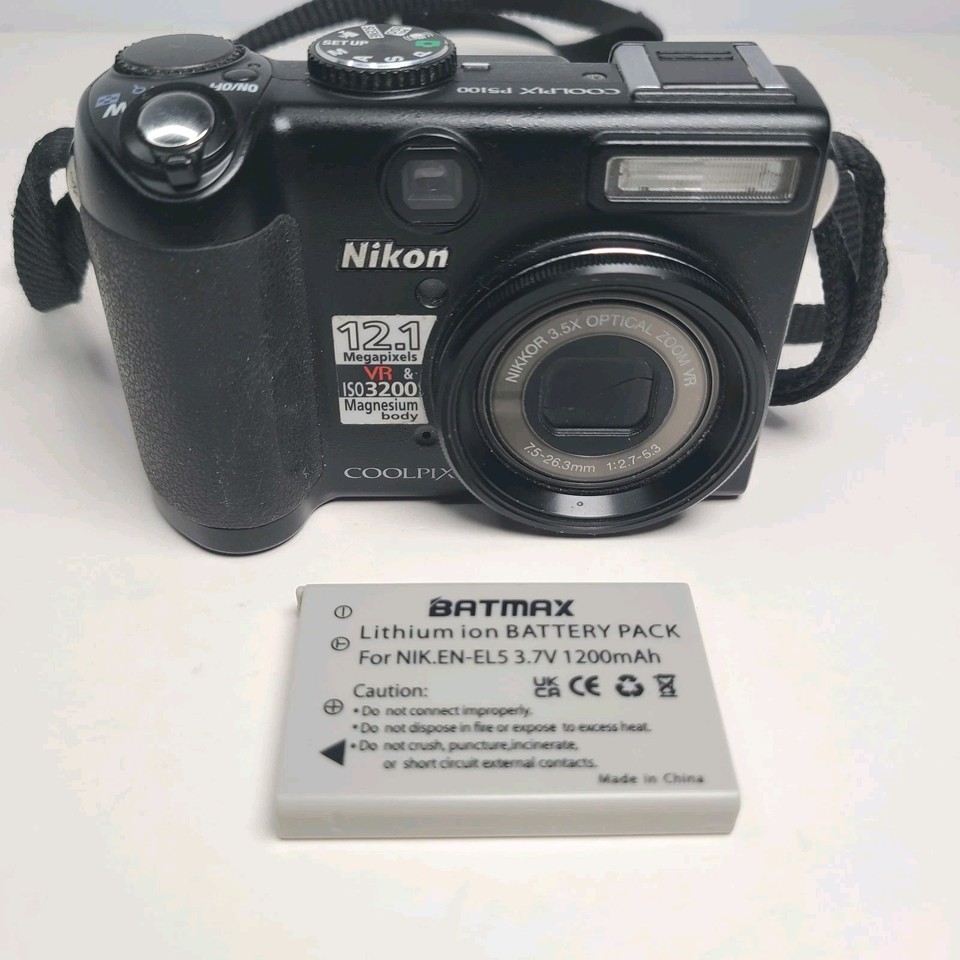 Nikon P5100 – Appareil Photo Numérique 12,1 Mp – Avec Sacoche Et Chargeur – Occasion
