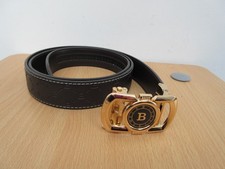 Dark brown ratchet belt with gold "B" buckle, length 50in