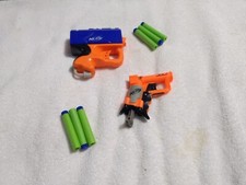2 MINI NERF GUNS PLUS 6 DARTS