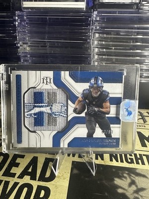 Read + 2024 Panini National Treasures Amon-Ra St. Brown Tremendous Treasures /99