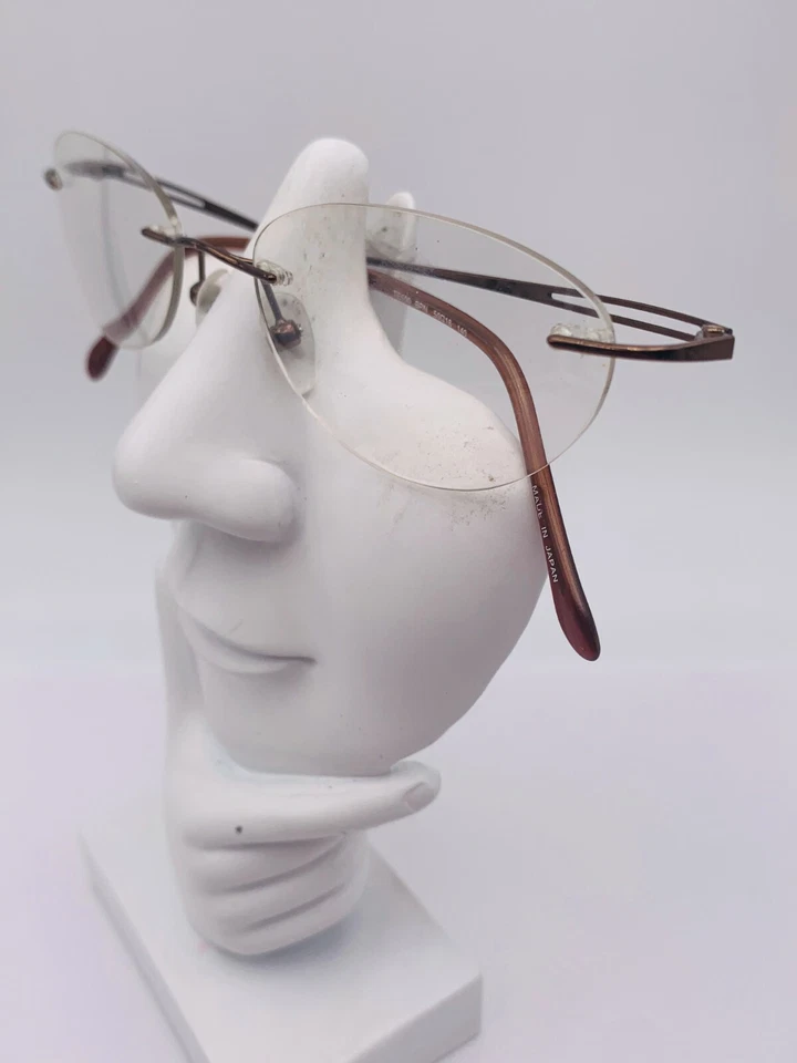 Gafas de sol vintage Tura TE500 bronce metal ovaladas sin montura Japón SOLO MARCOS Foto 3 de 4