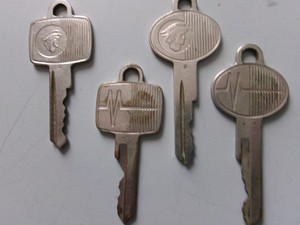 Four Vintage Mercery Car Keys