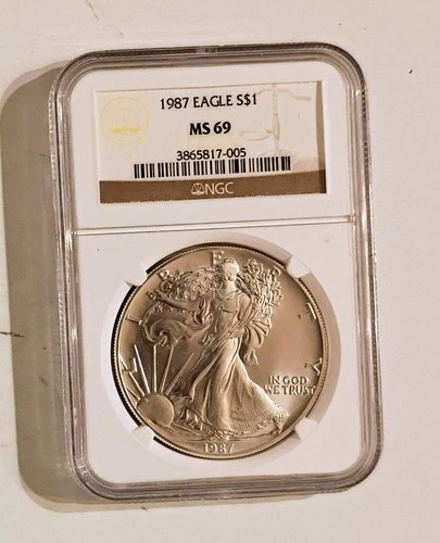 2 Coins 1987 Am Silver Eagle NGC MS69 & 1899 O Morgan Silver Dollar ANACS MS 68