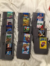 Nintendo NES Original With Games Two Controllers, Cables, And Duck Hunt Gun
