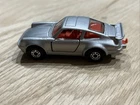 Lesney Matchbox SF #3 Porsche Turbo, silver body, black base, red  interior Mint