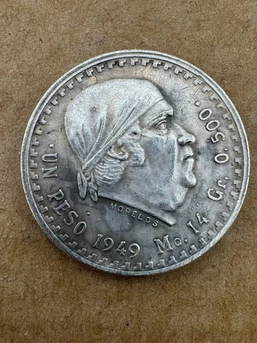 1949 Mexico Un Peso Silver — photo from the most recent tracked eBay sale