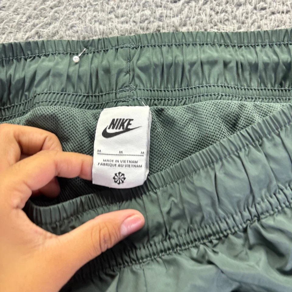 Pantalones de chándal vintage Nike para hombre medianos verdes de poliéster calce de malla forrados Foto 3 de 4