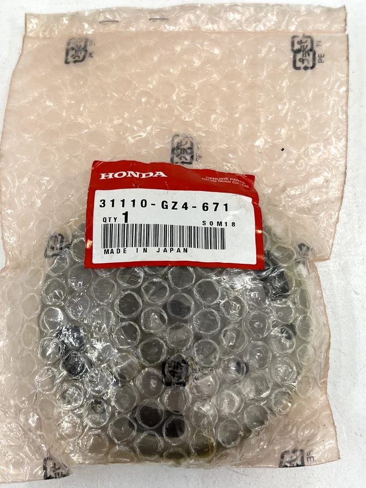 MOTO HONDA 31110-GZ4-671 ORIGINAL 1991-96 EZ90 VOLANTE (MITSUBA) NUEVO OEM Foto 3 de 4