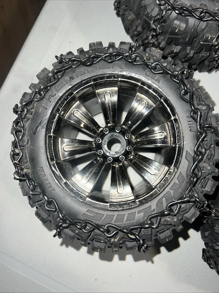 Proline Trencher 3.8" tires and rims. 17mm hex Black Chrome Rims W/ Chains RC - Image 3 of 4