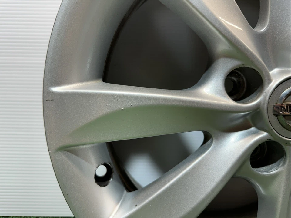 ✅ Llanta Nissan Versa Note 2013-2019 16 403009KK1A 403003VH1A OEM Foto 2 de 4