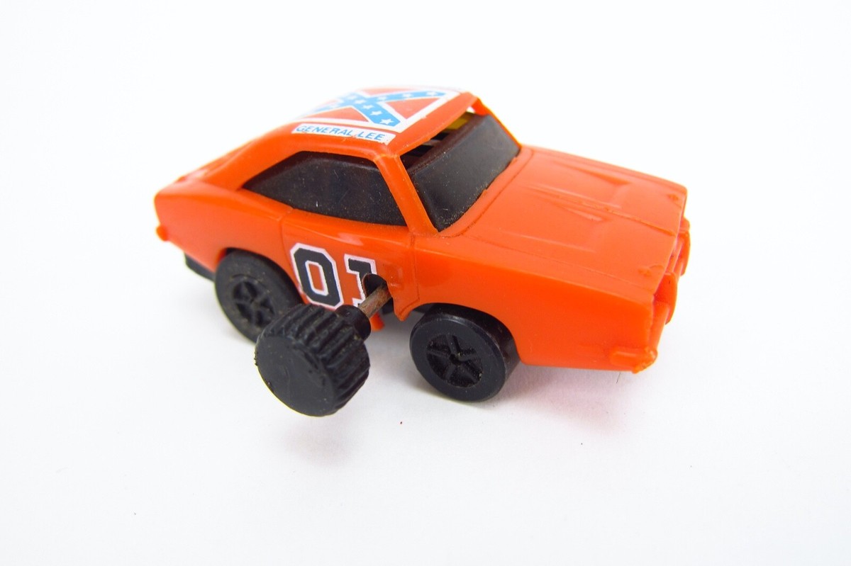 Vintage Dukes of Hazzard 1980's Wind Up General Lee 2 1/4 inch Toy