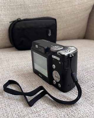 Nikon Coolpix P50 8.1MP 3.6x Zoom Digital Camera + 1GB SD + Case