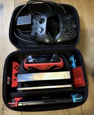 Nintendo Switch Console With 5 Games 4 Joycons, 3 Controllers, Case, And More