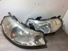 2006 SUZUKI SX4 PASSENGER & DRIVER SIDE FRONT HEADLIGHTS PAIR