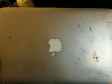 Apple MacBook Air A1369 13-Inch, Mid 2011. Powers On. For parts Or Repairs .