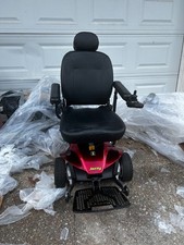 Candy Red Jazzy Select Elite ES power wheelchair with charger