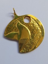 Pendentif doré décor colombe