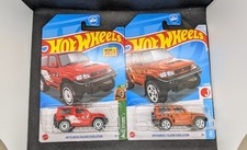 Hot Wheels Mitsubishi Pajero Evolution 1 Red & 1 Metalflake Burnt Orange