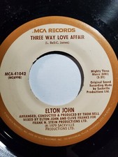 Elton John- Mama Can't Buy You Love,Three Way Love Affair 7