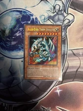 (WNR) YuGiOh TCG Blue-Eyes Toon Dragon MRL-000 Unlimited Secret Rare LP/VLP