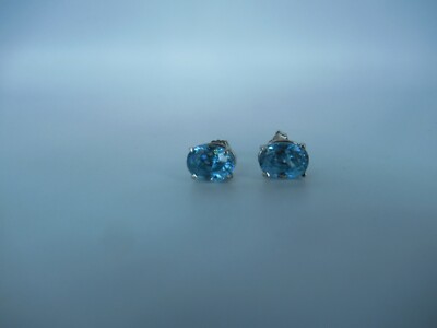 14Kt. White Gold Starlight Blue Zircon Earrings