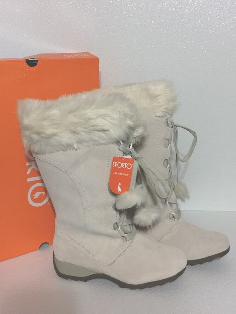 fur boots with pom poms