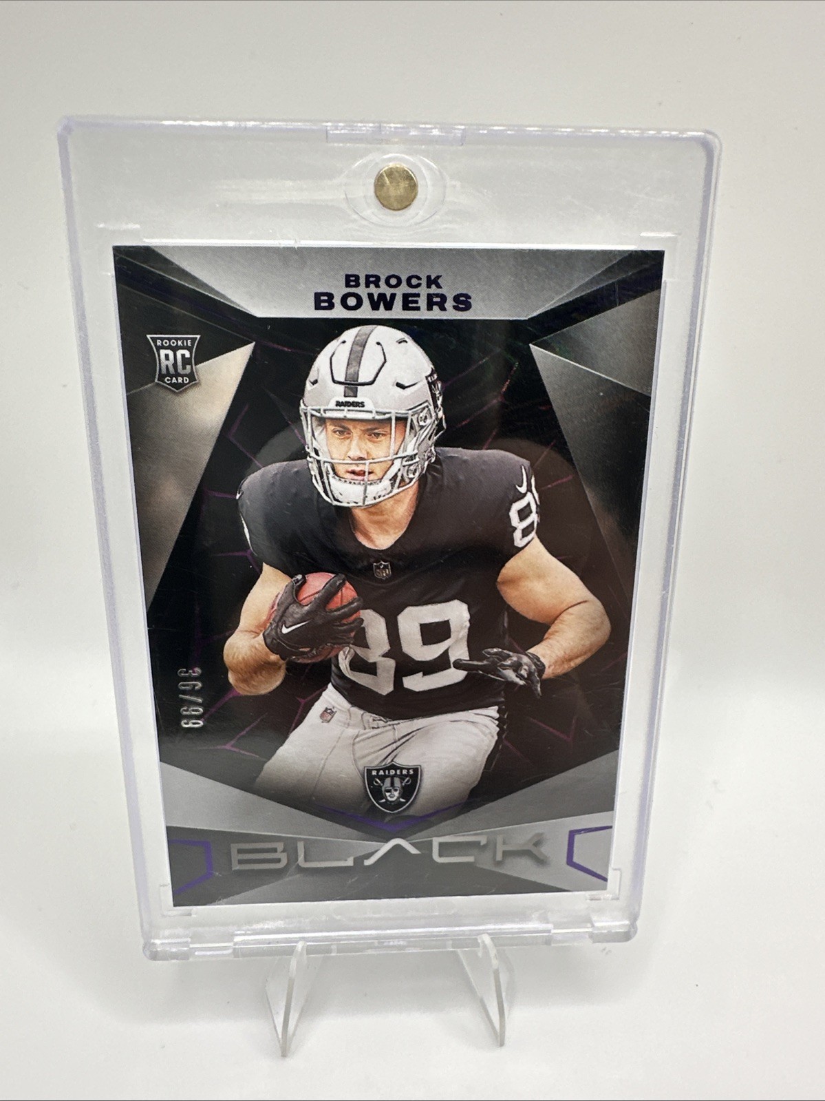 2024 Panini Black - Rookies Brock Bowers #114 Royal /99 (RC)