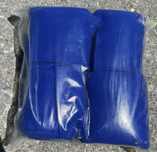 4 used blue fleece leg wraps