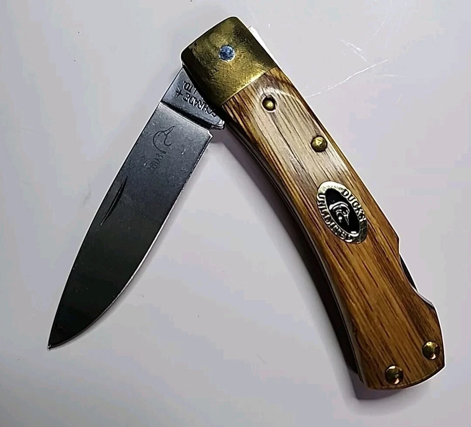CUCHILLO SCHRADE EE. UU. PATOS ILIMITADO LATÓN REFUERZO LB MADERA BRUIN Edición Limitada Foto 2 de 4