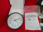 BNWT Basic Wall Clock, black plastic, 25 cm diameter, 5 cm thick, hanging hook