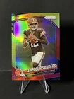2025 Prizm International- Shedeur Sanders Red and Yellow Prizm RC /44 Browns SP