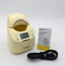 NEW Medela Waterless Milk Warmer