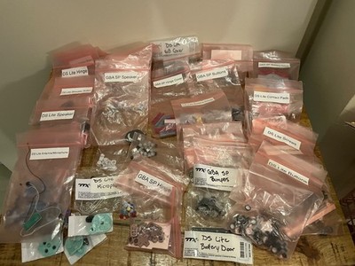 Nintendo DS Lite - Repair & Parts Lot Misc buttons, covers, speakers, and more