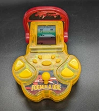 Vintage Formula One Racing Handheld Electronic Game Solar Tune Electronics 