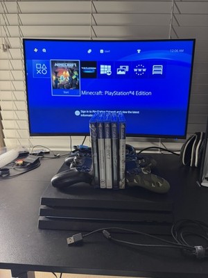 Sony PlayStation 4 Pro Bundle w/ 2 Controllers & 5 Games