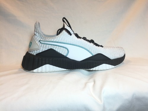 puma defy trainers white