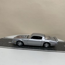 Auto World Vintage Muscle 1973-76 1975 Pontiac Firebird T/A Trans Am Silver NM