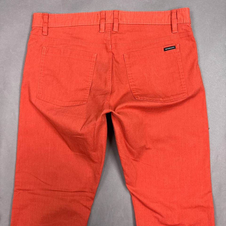 Pantalones de mezclilla Oakley para hombre 36x32 naranja golf campo de conducción oficina trabajo ajustados Foto 4 de 4