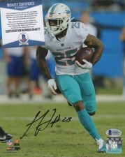 XAVIEN HOWARD MIAMI DOLPHINS  SIGNED  8X10 PHOTO BECKETT G94577