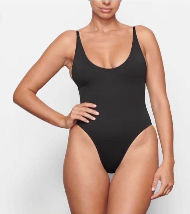 SKIMS::ワンピース[RESALE] Skims Down One Piece (Bodysuit) in Natural | Lyst
