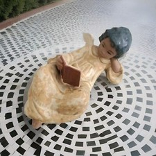 Lladro Portellana Gres Angelo Sdraiato con libro 