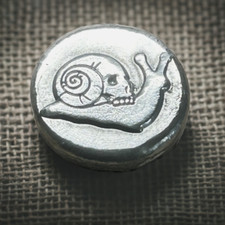 Gothic 1 Troy Oz Silver Round with Skull Snail Motif 45.00 per troy oz