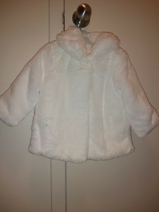 infant white fur coat