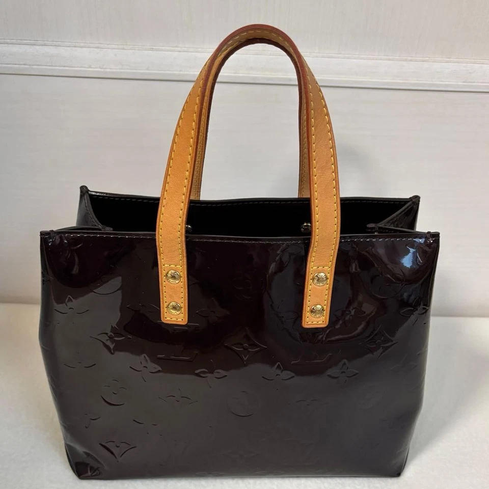 Louis Vuitton Reed PM en excelente estado Foto 4 de 4