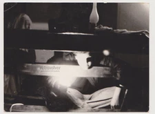 Handsome Young Man Illuminates His Face Breaking the Shadows with Gentle Glow