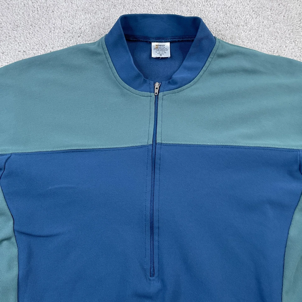 Camiseta Masculina Vintage Patagonia Ciclismo Azul Médio Capilene Terra Meio Zíper EUA - Imagem 2 de 4