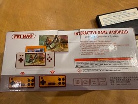 Famicom compatible portable console HG-938 with classic games